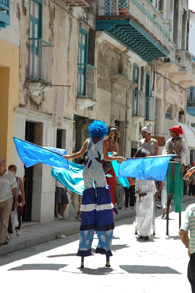 Photo: People on stilts.