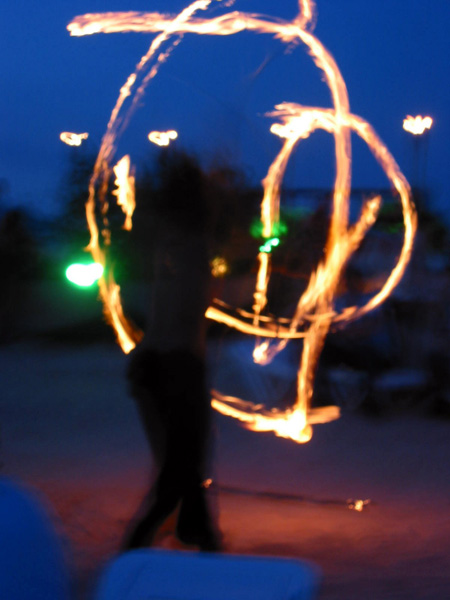 Photo: Someone doing fire poi.