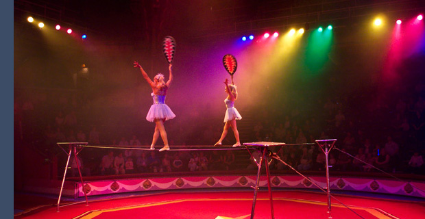 Two women on a tightwire.